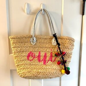 Straw “oui” tote bag with Pom poms